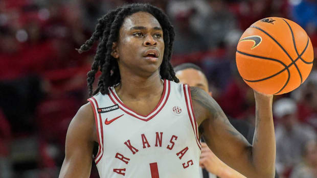 Razorbacks Keyon Menifield brings ball upcourt against Georgia